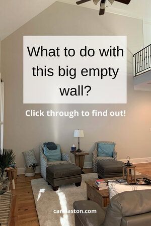 What To Do With Large Wall Space, Decorate High Ceilings Living Room, Decorating Vaulted Walls Living Rooms, How To Decorate Walls In Living Room, Great Room Wall Decor Ideas, How To Decorate Vaulted Ceiling Walls, Cathedral Wall Decor Ideas Living Room, Big Frames On Wall, Uneven Wall Decor Ideas