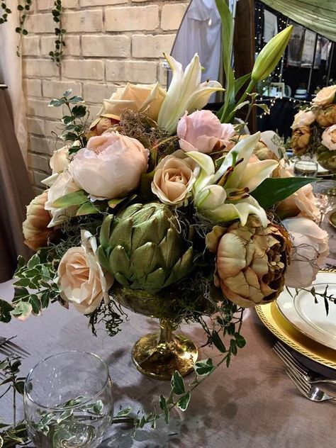 Centerpiece. A mix of silk and fresh flowers, greenery and yes, even an artichoke! #elegantcenterpiece #goldcompotecenterpiece #southernoregonweddings #oregonweddingdesigners Artichoke Centerpiece, Budget Wedding Centerpieces, Unique Wedding Centerpieces, Rose Floral Arrangements, Elegant Centerpieces, Green Flowers, Centerpiece Decorations, Artichoke, Shower Decorations