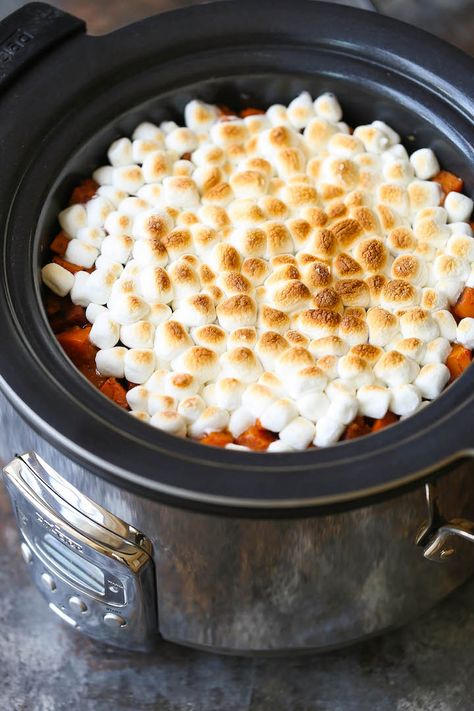 Slow Cooker Sweet Potato Casserole - That ooey gooey marshmallow topping!!!! All made in a crockpot. So easy without taking any oven space. Double win! Slow Cooker Sweet Potato Casserole, Sweet Potato Casserole Crock Pot, Sweet Potato Casserole With Marshmallows, Thanksgiving Crockpot Recipes, Crock Pot Sweet Potatoes, Sweet Potato Side Dish, Sweet Potato Sides, Slow Cooker Sweet Potatoes, Crock Pot Potatoes