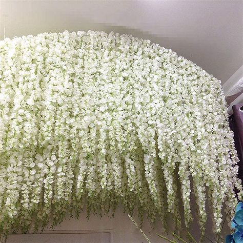 PRICES MAY VARY. ✿【SIZE AND QUANTITY】1M/3.3FT long for each hanging wisteria garland ; 20pcs artificial hanging wisteria flowers in every package. ✿【REALISTIC AND LIFELONG】Veryhome Silk Wisteria Vine come in lifelike,Full and soft petals,Natural-looking and won't fade over time; Available in all colors,beautiful wedding home party decoration. ✿【PERFECT FOR WEDDING DECOR】Artificial wisteria,wisteria is a symbol of love and happiness.they add color and fullness to wisteria vine arrangements,with c Wedding Rattan, Wreath Rattan, Wisteria Wedding, Wisteria Vine, Wisteria Flowers, Garland Wreath, White Wisteria, Flowers Fashion, Hanging Vines