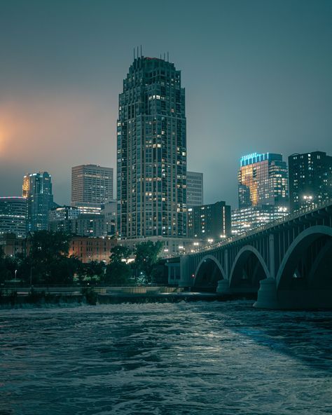 The Minneapolis skyline and Mississippi River at night in Minneapolis, Minnesota Minneapolis Aesthetic, River At Night, Minneapolis Photography, Minneapolis Skyline, Minneapolis City, Skyline At Night, Rail Transport, Hotel Motel, Posters Framed