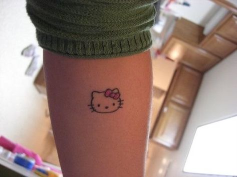 hello kitty tattoo sanrio Small Hello Kitty Tattoo, Tatuaje Hello Kitty, Small Hello Kitty, Hello Kitty Tattoo, Stick Poke Tattoo, Kitty Tattoo, Grunge Tattoo, Hello Kitty Tattoos, Stick N Poke Tattoo