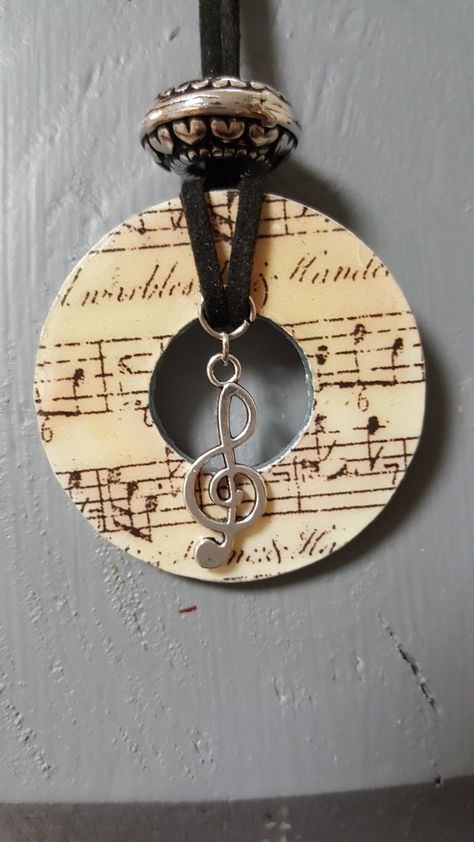 Washer pendant with scrapbook paper. Finished off with music charm, cording and a bead. Metal Washer Jewelry, Washer Jewelry Diy How To Make, Washer Jewelry Diy, Washer Earrings, Washer Necklace Diy, Washer Crafts, Washer Necklaces, Alcohol Ink Jewelry, Washer Jewelry