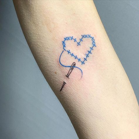 30 Embroidery Tattoos That Show Off This Emerging Trend | Have you seen these cool embroidery tattoos yet? Lifestyle Stitch Tattoo Design, Embroidery Tattoo Ideas, Mosaic Tattoo, Embroidery Tattoos, Cross Stitch Tattoo, 40 Tattoo, Sewing Tattoos, Body Tattoo Design, Cool Embroidery