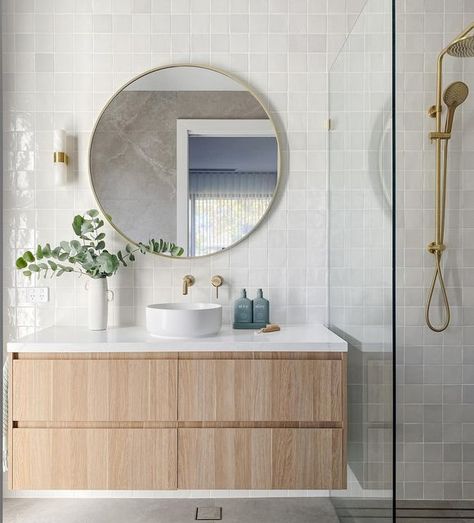 INTERIOR DESIGN | STYLING & DECORATING on Instagram: "✨Introducing the guest en-suite at our Somerton Park Project ✨

We wanted to create a space that was both understated and yet had a subtle wow factor. Our goal was to design a guest bathroom that would feel welcoming and luxurious, but also timeless. I think we nailed it 😉

To achieve this, we focused on selecting classic finishes and fixtures that would stand the test of time. We chose a neutral color palette of warm grays and whites, which creates a calming and peaceful atmosphere. 

The feature tile is the Zellige Ceramic Gesso and the floor tile is Anzo Moon Matt both from @ceramicatiledesign 🙌🏼

The custom-built vanity features clean lines and a timeless design. We paired it with a stunning marble countertop, one feature wall li Timeless Ensuite Bathroom Ideas, Feature Wall Ideas Bathroom, Bathroom Feature Tile, Bathroom Fixtures And Finishes Ideas, Bathroom Neutral Colors, Bathroom Furniture Ideas, Bathroom Feature Wall Tile, White Marble Tile Bathroom, Modern Bathroom Furniture