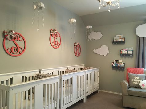 Triplet toddler nursery in gray, white and coral with a cloud theme. Reading nook with wall shelves to store books out of busy toddler reach. Triplet nursery , toddler bedroom Nursery For Triplets, Triplets Nursery Luxury, Triplet Nursery, Baby Nursery Cribs & Toddler Beds, Triplet Room Ideas, Triplets Bedroom, Triplets Nursery, Cloud Theme, Toddler Bedroom Girl