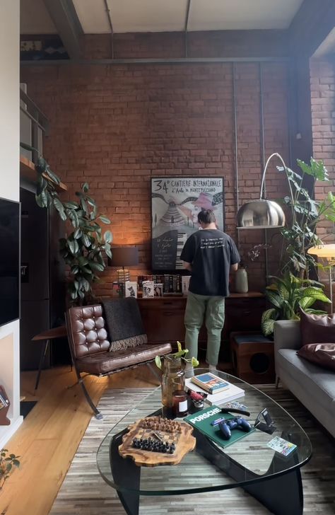 Male Home Aesthetic, Apartment Men Decorating, Urban Maximalist Decor, Edgy Studio Apartment, Nyc Apartment Men, Men Loft Apartment, Creative Living Room Design, Mid Century Modern Loft Apartment, Brick Loft Apartment Decor