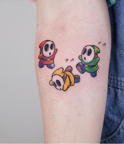 Shy Guy Mario Tattoo, Mario Sibling Tattoos, Paper Mario Tattoo Ideas, Shy Guy Tattoo Design, Yoshi Tattoos Ideas, Cute Mario Tattoo, Mario Themed Tattoos, Nintendo Sleeve Tattoo, Simple Mario Tattoo