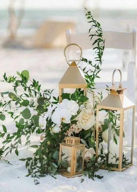 Bright Green, Ivory and Gold Winter Wedding Inspirations - ColorsBridesmaid Gold Winter Wedding, Wedding Aisle Outdoor, Beach Wedding Aisles, Winter Wedding Table, Gold Lanterns, Flowers And Greenery, Wedding Aisle Decorations, Wedding Lanterns, Winter Wedding Inspiration