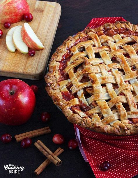 Cranberry apple pie is a festive twist on a classic dessert. Cranberries and raisins are baked with sweet apples and spices in a sweet glazed homemade pie crust. Cranberry Pie Filling, Cranberry Apple Pie, Pie Lattice, Thanksgiving Dessert Table, Lattice Pie Crust, Lattice Pie, Apple Cranberry Pie, Best Pie Recipes, Holiday Pie