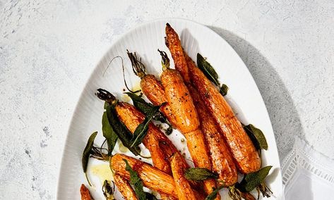 Roasted Carrots with Crispy Sage Leaves | Daily Mail Online Baked Carrots, Sage Leaves, Roasted Carrots, Daily Mail, Carrots, Butter, Holidays, Baking