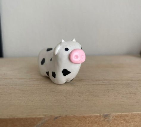 This product is a small cow made with Polymer Clay. It is handmade by me so each one is unique and not the exact same as any other. These cows are great to keep in your pocket or can keep you company at your desk or in your home! Clay Animals Air Dry, Cute Small Air Dry Clay Ideas, Cow Clay Magnet, Small Clay Art Ideas, Air Dry Clay Date Night, Cute Crafts With Clay, Air Dry Clay Projects Animals, Small Clay Figures Ideas, Mini Clay Art Animals