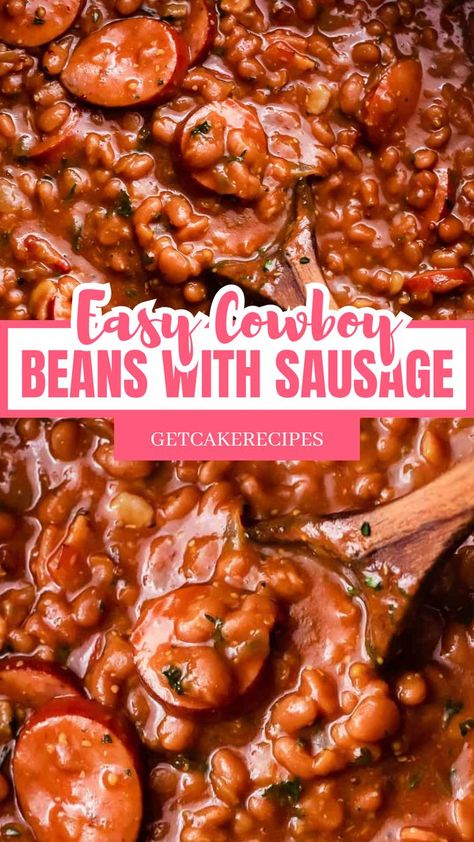 This may contain: a bowl of a mix of beans, sausage, a flavorful sauce, and a Wooden spoon. Baked Beans And Smoked Sausage, Cowboy Beans With Hamburger And Sausage, Smoked Sausage Cowboy Beans Recipe, Baked Beans With Smoked Sausage, Crockpot Baked Beans With Sausage, Dinner Recipes Using Smoked Sausage, Appalachian Soup Beans, Crockpot Beans And Sausage, Baked Beans Sausage