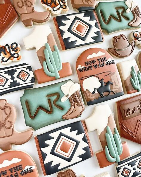 Jessika Eoff on Instagram: "How the West was One. This cookie theme is now ranked in my top 5 faves. 🤩 All the rusts and browns and western scenery. 🏜️🧡🌵 #cottonlanebakery #westerncookies #howthewestwasonecookies #howthewestwasone #cactus #canyons #boots" Rodeo Cookies Western Parties, How The West Was One Cookies, How The West Was One Cake, Western Themed Cookies, Rodeo Cookies Decorated, How The West Was One Birthday Theme, Western Birthday Cookies, Western Wedding Cookies, How The West Was One