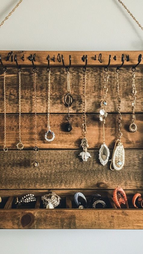 Keep your jewelry organized and tangle-free with this DIY jewelry organizer! Using simple materials like wood, hooks, or even repurposed frames, you can create a stylish display that adds character to your room while keeping your accessories in order. Perfect for creating a personalized, functional storage solution! ✨💍 #DIYJewelryOrganizer #CreativeStorage #HomeOrganization #DIYProjects Homemade Necklace Holder, Wall Jewelry Organizer Diy, Diy Jewelry Wall Display, Homemade Jewelry Holder, Jewelry Organizer Ideas, Diy Jewelry Wall, Diy Jewelry Stand, Jewelry Wall Display, Diy Necklace Holder