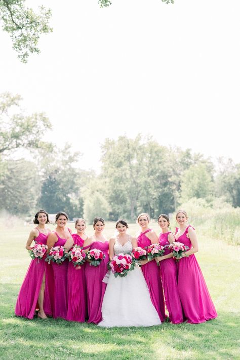 Bride with bridesmaids at hot pink theme wedding Barbie Pink Wedding Theme, Dark Green And Pink Wedding, Hot Pink Wedding Theme, Hot Pink Wedding Colors, Dark Pink Wedding, Pink Wedding Color Palette, Pink Bridal Party, Hot Pink Bridesmaid Dresses, Hot Pink Bridesmaids