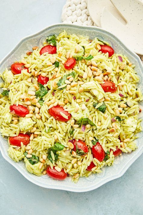 This quick and easy orzo pesto salad is loaded with fresh basil, cherry tomatoes, and fresh mozzarella. A perfect light lunch or side dish! Orzo Pesto, Easy Orzo, Pesto Salad, Light Lunch, Fresh Mozzarella, Orzo, Fresh Basil, Cherry Tomatoes, Side Dish