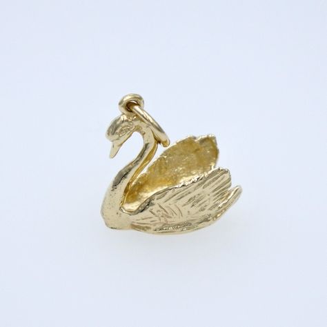 SJCo Jewellers Manufacturers of fine Jewellery Item Description SOLID 9CT YELLOW GOLD SWAN CHARM  RRP - $299 Height: 14.8mm (not including jump ring) Width: 9.1mm  Length: 14.6mm Weight: 2.5 grams Each charm comes delivered in its own pouch, perfect for gift giving. All items are guaranteed to be 100% solid 9ct gold. We are a Sydney based workshop specialising in handmade chains, bangles and rings as well as vintage jewellery and watches. Our goal is to provide our complete customer satisfaction. Every week a new lot of items are listed so there is always something special. All items listed are as described, otherwise you will be provided with a money back guarantee. ✔ Follow us On Social Media Instagram - @schweinsberg_jewellery_co Swan Jewelry, Gold Swan, Swan Necklace, Solid Gold Charms, Handmade Gold Jewellery, Stacked Jewelry, Dream Jewelry, Pretty Jewellery, Fine Jewellery