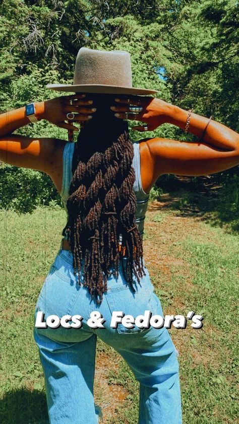 Locs•Fashion•SAHM life on Instagram: "Locs and Fedora’s 😍 I love a good hat and loc look. Absolutely adore fedora’s and this one by GigiPip doesn’t disappoint. ✨Hat link in my bio . . . . . . . . #hats #locstyles #locs #locstylesforwomen #locstyle #loccommunity #locjourney #locdhaircommunity #locsandmelanin #locblogger #loccrush #locbae #locgoddess #locgoals #locgrowth #naturalhair #locs_18 #locnation #gigipip" Locs With Fedora Hat, Cowboy Hat With Locs, Fedora With Locs, Hats For Dreadlocks, Locs And Fedoras, Hats Over Locs, Hat Over Locs, Loc Styles With Hats, Locs With Hats Women