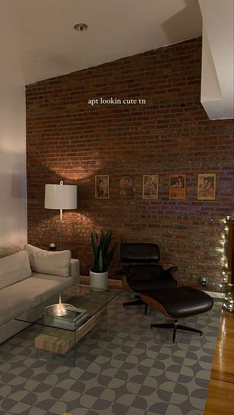 Exposed Brick Apartment Living Room, Exposed Brick Apartment Aesthetic, Industrial Urban Living Room, Exposed Brick Interior Design, Brick Apartment Aesthetic, Black Floor Living Room, Exposed Brick Living Room, Exposed Brick Apartment, Cozy Masculine Living Room