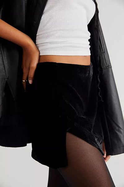 A true must-have mini, this skirt adds the perfect touch of texture to any look. Just as effortless as it is essential, pair this skirt with your favorite graphic tee or strappy bodysuit for endless ways to wear. Fit: High-rise, slim silhouetteFeatures: Textured velvet fabrication, curved hemline with vent detail, invisible zip closure Care/Import Hand Wash Cold Separate Import Measurements for size 6 Waist: 32.75 in Length: 13.5 in Velvet Mini Skirt Outfit, Black Velvet Mini Skirt, Maxi Skirt Fall, Strappy Bodysuit, Fall Maxi, Utility Skirt, Velvet Mini Skirt, Mini Skirt Black, Velvet Jumpsuit