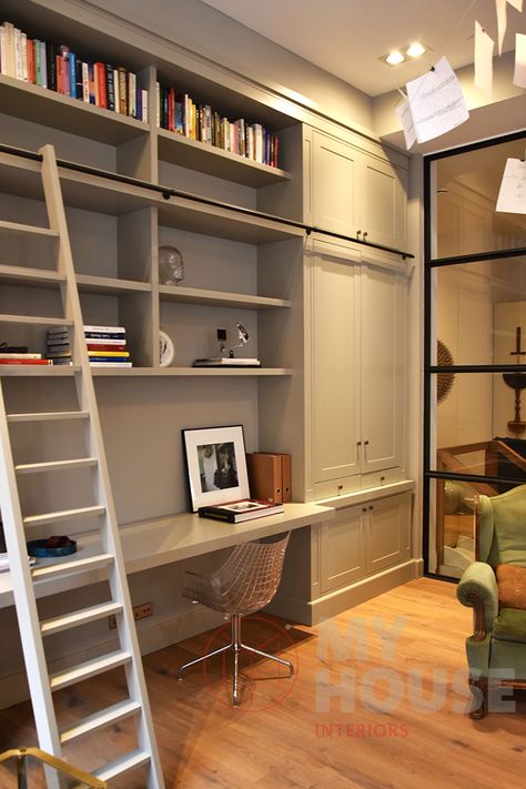 Classical designed bookcase with open spaces and a desk. The basic classic setting goes well in this eclectic room with steel and brick. Nicely designed in Amsterdam by MyHouse. The choice of the light green makes the wall unit bookshelves fade away in the room. Wall Bookcase With Desk, Wall Unit Bookshelves, Built In Wall Units With Desk, Wall To Wall Bookshelves Bedroom, Bookcase Desk Built In, Built In Wall Units Bedroom, Bookcase And Desk Wall, Bookcase Wall With Desk, Built In Library Wall With Desk