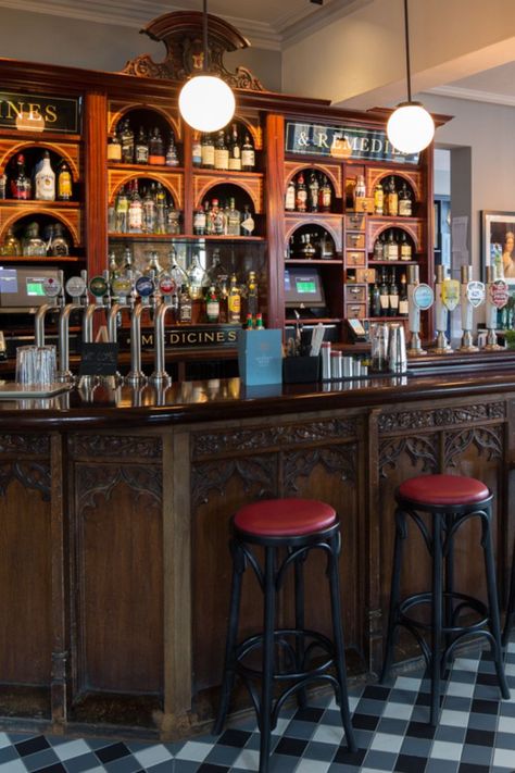 Queens Head Hotel Victorian Home Bar, Bar Counter Aesthetic, Victorian Bar Design, Bar With Antique Mirror, Apothecary Bar, Witchy Home Aesthetic, Antiqued Mirror Bar, Old English Pub Aesthetic, Back Bar Design