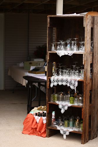 via {frolic!} Mismatched Wine Glasses Wedding, Wine Glass Display Ideas For Party, Wedding Glasses Display, Displaying Glassware, Bar Glassware Display, Mismatched Glassware Wedding, Thrifted Wedding Decor, Vintage Glassware Wedding, Glassware Display