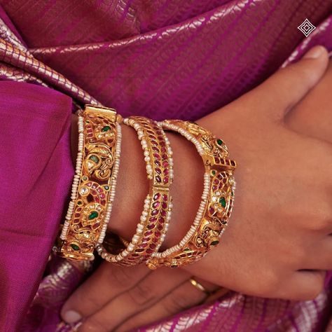 The gold touch of timeless beauty in your hands with our exquisite 22K gold Jadau bangles. Featuring intricate floral motifs, precious rubies, valanda, emeralds, and gold Lakshmi designs, these bangles are the epitome of luxury and tradition. WhatsApp 9964641869 for enquiries. 📍Visit the Blue CKC&Co. Flagship store , near Safina Plaza. Look for the DIAMOND logo! #CKCCo #JewelleryLovers #InstaJewellery #JewelleryAddict #HandmadeJewellery #IndianJewellery #TraditionalJewellery #IndianBridalJ... Jadau Bangles, Gold Touch, Indian Bridesmaids, Diamond Logo, Beads Mala, Bangles Design, Bangle Designs, Bangles Bracelets, Touch Of Gold