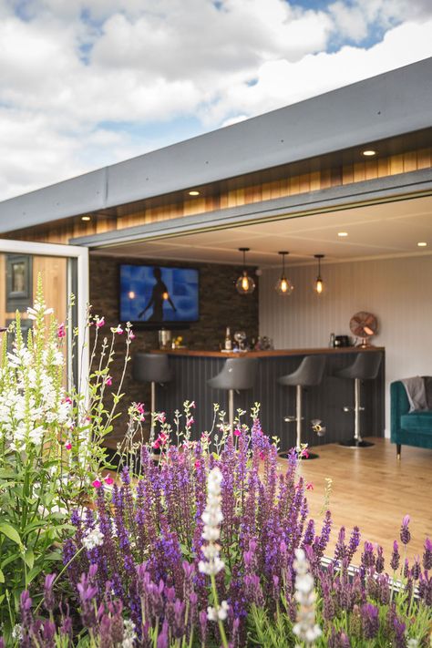 looking inside a garden bar through open bifold doors