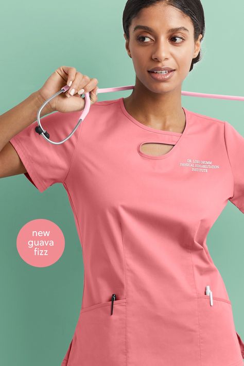 Female medical professional wearing the UA Butter-Soft STRETCH Women's 2-Pocket Asymmetric Keyhole Scrub Top in the color Guava Fizz Nurse Style Scrubs Fashion, Scrub Suit Design, Scrubs For Women, Stylish Scrubs, Medical Scrubs Outfit, Scrubs Medical, Scrubs Dress, Pink Scrubs, Doctor Outfit