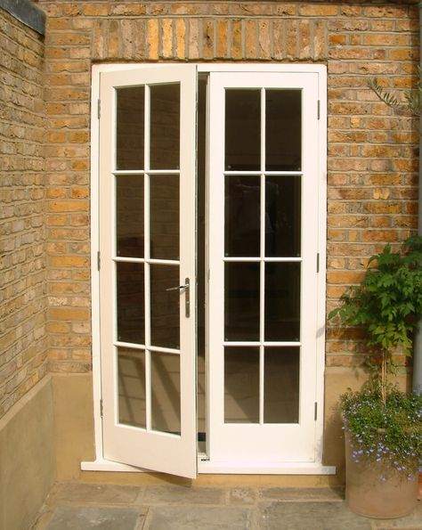 Stylish pair of external French doors. Opening outward, these garden doors have toughened clear glass panes and a nickel lever door handle. French Doors Cottage, Small French Doors Exterior, Wooden French Doors Exterior, External Glass Doors, Small French Doors, Narrow French Doors, Glass Entrance Doors, Wooden French Doors, External French Doors