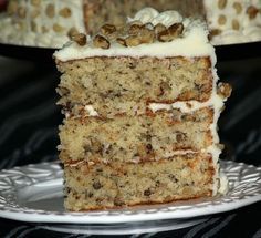 Learn how to make Black Walnut Cake Recipe frosted with a cream cheese frosting. This cake is baked in 3 eight inch round pans for about 30 minutes. Each layer is filled with the cream cheese frosting and I decorated with black walnut pieces. Banana Black Walnut Cake, Old Fashioned Black Walnut Cake Recipe, Black Walnut Cake Recipe, Walnut Cake Old Fashioned, Black Walnut Cake Old Fashioned, Cake With Nuts Recipe, Black Walnut Recipes, Black Walnut Pound Cake Recipe, Nut Cake Recipes