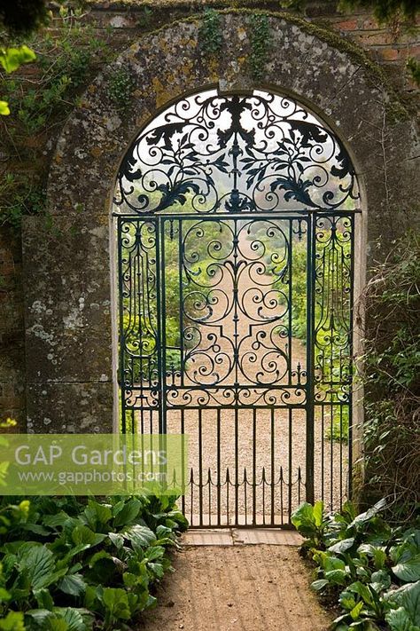 Blue wrought iron gate into the Walled Garden - Rousham House, Bicester, Oxon, UK Ornate Gates Wrought Iron, Victorian Iron Gates, Garden Iron Gate, Metal Garden Gate Ideas, Gate For Garden, Old Garden Gates, Arches Design, Ornamental Iron Gates, Wrought Iron Garden Gates