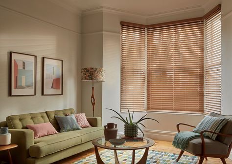 Mirage rich oak faux wood venetian blinds in living room bay window Venetian Blinds Bay Window, Bay Window Treatments Living Room, Venetian Blinds Living Room, Modern Bay Window Ideas, Wooden Blinds Living Room, Blinds Bay Window, Window With Blinds, Bay Window Curtain Ideas, Modern Bay Window