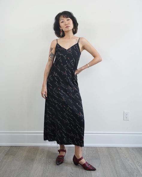 Available for Story Exchange only: Thrifted Spaghetti Straps Black slip dress with Floral illustrations, bias cut, raw hem. 100% polyester, Marked XS. Measurements// Chest/ Wasit:34” Length: 49” (adjustable straps) #ClothesForHearts #thriftedstyle #secondhandclothing #preloved #sustainablefashion #slipdress #torontovintage #vintagestyling #clothingswap Clothing Swap, Black Slip Dress, Floral Illustrations, Second Hand Clothes, Sustainable Fashion, Spaghetti Strap, Slip Dress, Adjustable Straps, Spaghetti