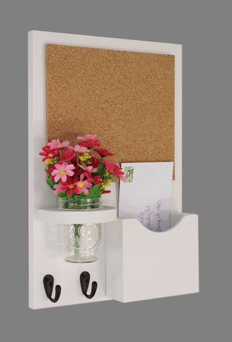 This beautiful cork organizer would work perfectly in an entry way or kitchen. It is the perfect place for grocery list, business cards and little bits of paper you don’t want to lose. It has two key hooks that can be used for keys or even dog leashes. The jar vase that is included can Diy Letter Holder, Diy Mail And Key Holder, Key Organizer Wall, Key Holder Ideas, Mail And Key Holder, Advanced Woodworking Plans, Woodworking Shop Projects, Shop Projects, Woodworking Plans Diy