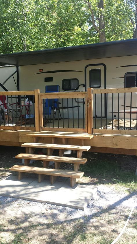 Camper Patio Ideas Diy, Deck On Camper, Diy Rv Ideas, Camper Lot Landscaping, Rv Lot Landscaping Ideas Patio, Camper Lot Ideas, Camper Lake Lot Ideas, Decks For Campers, Travel Trailer Permanent Site Ideas