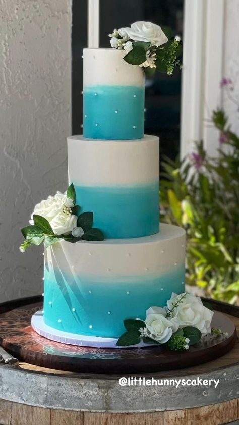 White and teal buttercream wedding cake in 2022 | Ombre cake blue, Cake design, Buttercream wedding cake Blue Cake Design, Cake Design Buttercream, Teal Cake, Tiered Cake Design, Edible Pearls, Two Tier Cake, Ombre Cake, Buttercream Wedding Cake, Blue Cakes