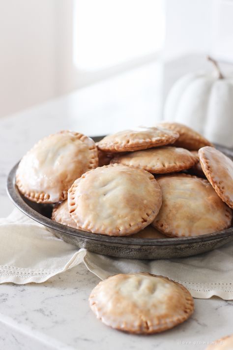 Maple Glazed Pumpkin Hand Pies - Love Grows Wild Pumpkin Hand Pies, Wedding Recipes, Baking Lessons, Pumpkin Filling, Train Pumpkin, Eco Food, Hand Pie Recipes, Maple Pumpkin, Hand Pie