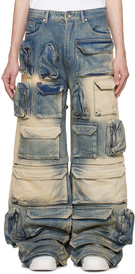 Non-stretch denim cargo pants. Fading, bellows pockets, and zip pockets throughout. · Paneled construction · Belt loops · Five-pocket styling · Zip-fly · Leather logo patch at back waistband · Logo-engraved silver-tone hardware · Contrast stitching in beige Supplier color: Denim Upcycling Pants, Mens Denim Inspiration, Street Wear Male, Bratz Boy, Bape Jeans, Ev Bravado, Cargo Pocket Design, Pants Inspiration, Deconstructed Denim