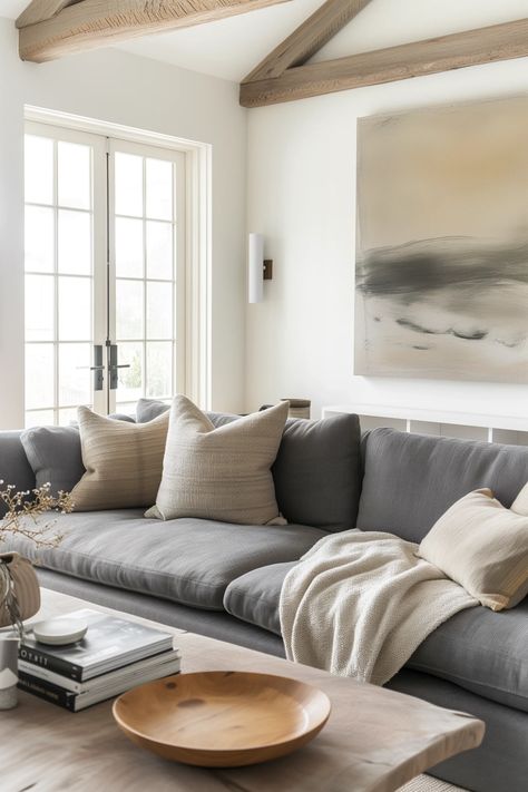 25 Stylish Grey Couch Living Room Ideas That Look Amazing Darker Couch Living Room, Grey Sofa Natural Living Room, Gray Sofa Farmhouse Living Room, Grey Sofa Throw Ideas, Throws For Grey Sofa, Grey Couch Basement Ideas, Farmhouse Gray Couch Living Room, Nordic Living Room Grey Sofa, Coastal Gray Living Room