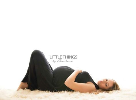 Maternity laying down Maternity Photography Laying Down, Maternity Laying Down Poses, Inside Maternity Pictures Ideas, Sitting Maternity Poses, Maternity 2023, Pregnant Shoot, Studio Maternity Shoot, Sleeping Pose, Couple Pregnancy Photoshoot