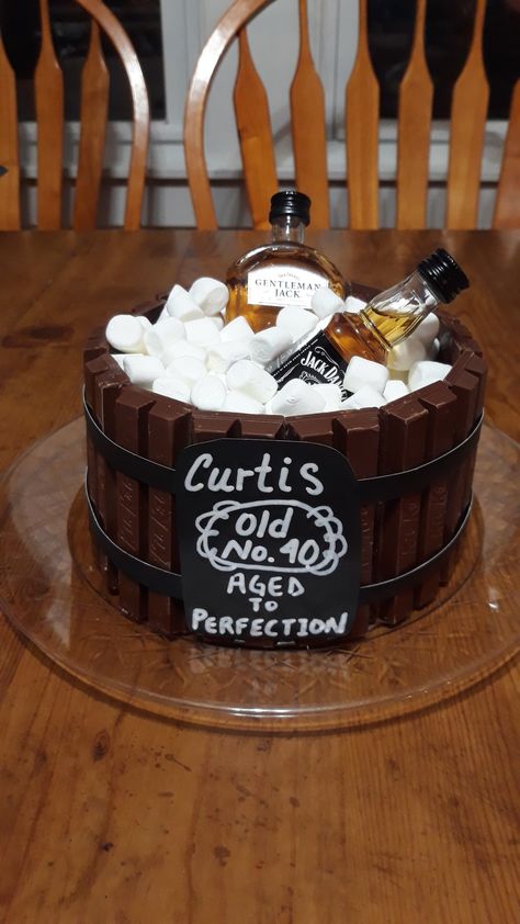 Brownies cut into circles stacked, kit kats around edges, & filled with marshmallows. Topped with little bottles of JD. Cake With Bottles On Top, Alcohol Bottle Cake, Cake With Alcohol Bottles On Top, Liquor Cake, Whiskey Cake, 40th Cake, Birthday Cake For Husband, Bottle Cake, Cake For Husband