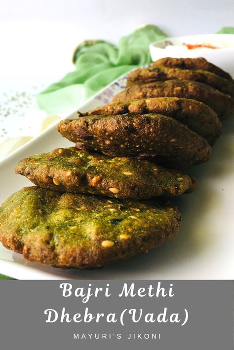 Soft and tasty Bajri Methi Dhebra or Vada is a fried Gujarati snack. Enjoy it with some yogurt or with masala tea. Include pearl millet or bajra and fresh fenugreek (methi) in your diet. #snacks #millet gujaraticuisine #inidancuisine #fenugreek Methi Recipe, Dinner Board, Gujarati Cuisine, Vegetarian Platter, Gujarati Snacks, Pearl Millet, Modernist Cuisine, Asian Recipe, Millet Flour