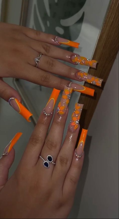 Orange Acrylic Nails Prom, Long Nails Coffin Summer, Orange Medium Acrylic Nails, Orange Nail Styles, Long Square Acrylic Nails Orange, Orange Nails With Initial, Extravagant Nail Designs, Baddie Birthday Nails Orange, Orange Sets Nails