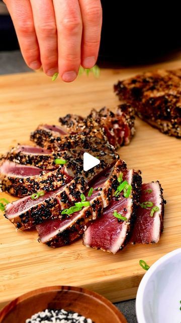 Ryan Carter 🍻 on Instagram: "Pan Seared Ahi Tuna.

This Pan Seared Ahi Tuna is fresh, flavorful, and perfect when you want something light yet filling. Fresh ahi tuna crusted in a mixture of sesame seeds, brown sugar, and garlic and onion seasonings. Sprinkle with @maldonsalt smoked sea salt - BOMB!

INGREDIENTS
*Makes 2 lbs

2 lbs sushi grade ahi tuna steaks (about 1.5-2 inch thickness)

MARINADE
+ 3 TBSP soy sauce
+ 1 tsp sesame oil

SESAME CRUST
+ 1/3 C sesame seeds
+ 1 TBSP brown sugar
+ 1 tsp garlic powder
+ 1 tsp onion powder
+ 1 tsp salt

Serve with smoked sea salt and sliced green onion.

DIRECTIONS

+ STEP 1: MARINADE
Combine the soy sauce and sesame oil in a shallow dish and then fully coat the ahi on all sides. Let the ahi sit at room temperature for ab Sides For Seared Ahi Tuna, Ahi Tuna Tacos Recipe, Tuna Ahi Recipes, Ahi Tuna Marinade Recipes, Pan Seared Ahi Tuna, Tuna Steak Marinade, Pan Seared Tuna Steak, Seared Tuna Steak, Fresh Tuna Recipes