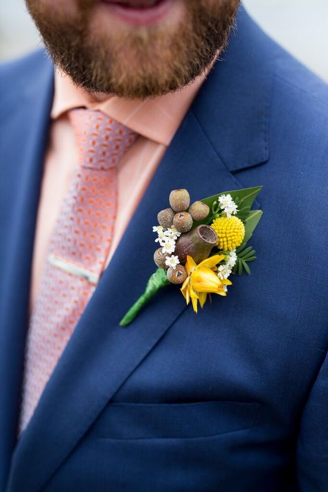 Australian native flower button hole with gum nuts, paper daisy and billy button Flowers: The Wildflower Place / PC: Coast Photography Australian Summer Wedding Flowers, Billy Button Bouquet, Billy Buttons Bouquet, Billy Button Flowers, Oct Wedding, Flowers 2023, Coast Photography, Button Holes Wedding, Billy Buttons