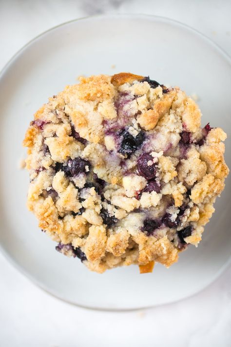 Buttermilk Blueberry Muffins are the perfect way to start your day! Every bite is bursting with blueberry flavor and a mouthwatering cinnamon streusel topping! #buttermilkblueberrymuffins #blueberrymuffins #breakfastrecipes #brunchrecipes #blueberryrecipes #muffinrecipes #blueberries #blueberrymuffinrecipewithbuttermilk #easyrecipes #familyfriendlyrecipes #buttermilkblueberrymuffinswithstreuseltopping Buttermilk Blueberry, Blueberry Muffins With Streusel Topping, Blueberry Buttermilk Recipes, Blueberry Buttermilk Muffins, What To Do With Buttermilk, Blueberry Muffins, Banana Chocolate Chip Bars, Basic Cupcake Recipe, Buttermilk Blueberry Muffins