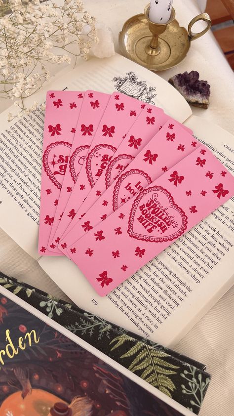 Handmade girly girl style bookmarks for book lovers. Bookmark Details:  - Bookmark dimensions: 15cm x 5cm - Printed in Greece on 400gsm textured matte card stock. - Bookmarks are available in different designs - Handmade by us. - Curved edge detail - Cute baby pink gingham pattern at the back Feel free to message me for any further questions or concerns! Mimi Coquette Bookmark, Pink Bookmark, Bookmark Dimensions, Romance Reader, Bookmarks For Books, Cute Bookmarks, Romance Readers, Gingham Pattern, Bookmarks Printable